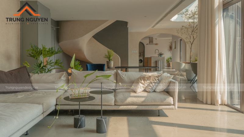 Sự kết hợp giữa chất liệu thô và bảng màu nhẹ nhàng tạo nên phòng khách an yên