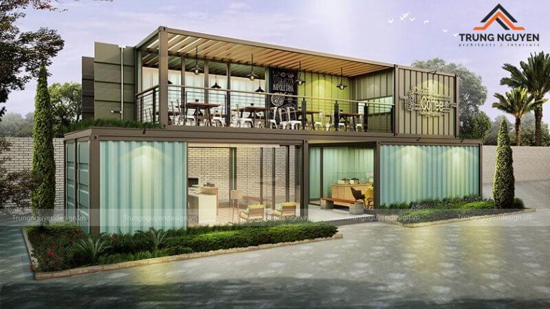 Quán cafe container tối giản với tông màu trắng chủ đạo và cửa kính lớn nhìn ra sân vườn