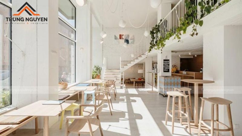 Quán cafe ấm cúng theo phong cách Bắc Âu với ánh sáng tự nhiên và vật liệu gỗ sáng màu