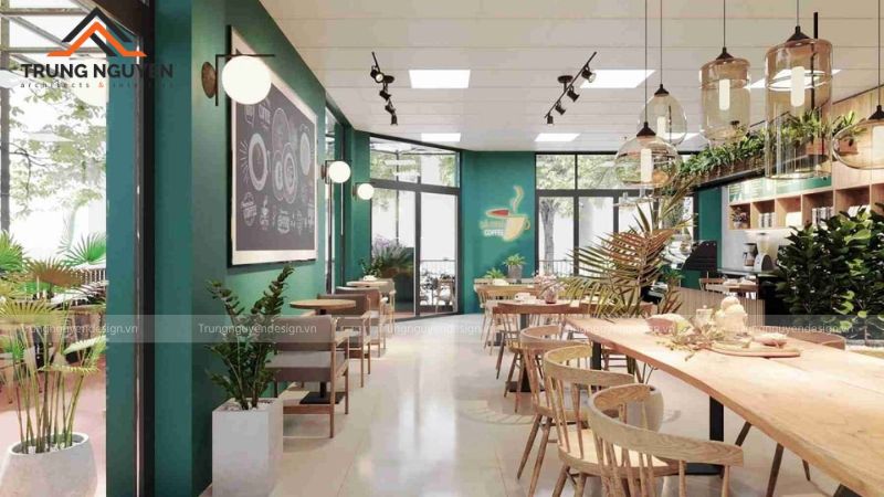 Quán cafe tận dụng ánh sáng tự nhiên từ cửa kính lớn cho không gian sáng sủa