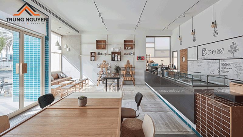 Quán cafe tối giản sử dụng màu sắc đơn sắc và ánh sáng tự nhiên tạo cảm giác rộng rãi