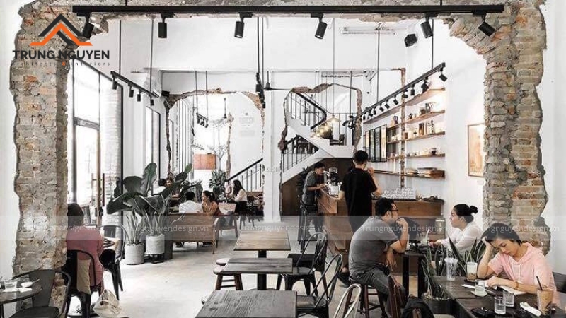 Không gian cafe mộc tối giản với gam màu trung tính chủ đạo, nội thất đơn giản